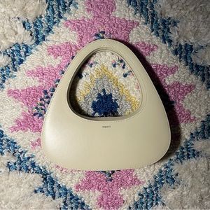 Coperni swipe bag in cream or off white